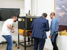 Guests gathering in the School of Art & Design Glass Workshop for the official launch of the printer. Photo: Yun Hu / ANU