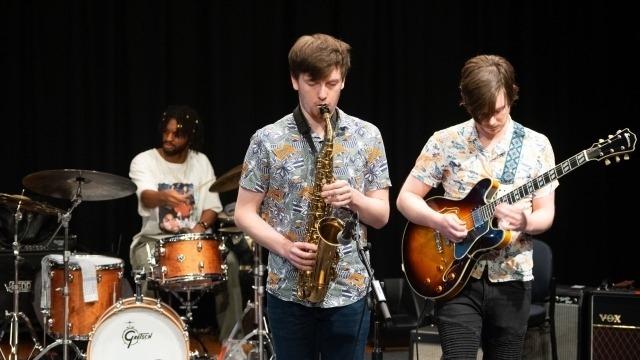 Image: Elisha Adisa (drums), George Butler (saxophone) and Cian Boesen (guitar) at the Friends of the School of Music Ensemble Prize 2024. Photo by Yun Hu.