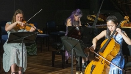 Image: ANU School of Music student Jojo Yuen (piano), Eloise Ng (cello) and Lucy Arras (violin). Photo by Yun Hu /ANU.